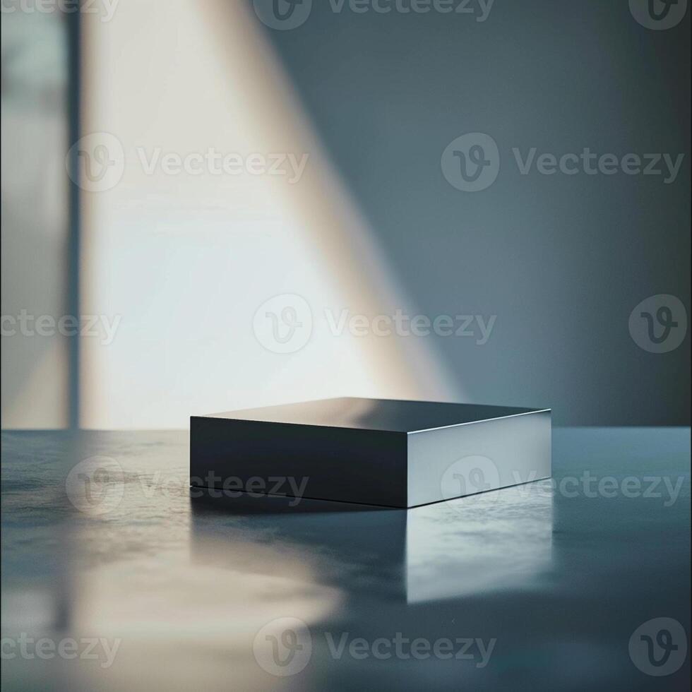 A black box sitting on a table in front of a window photo