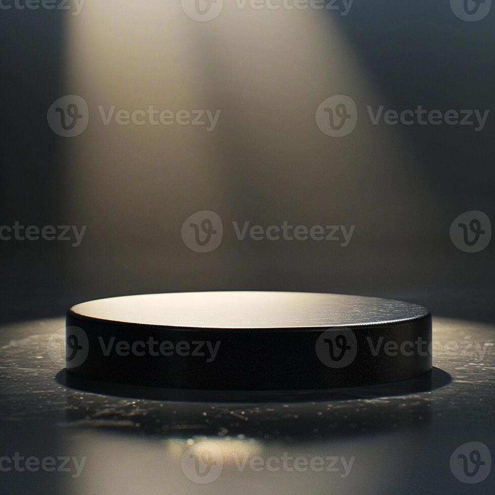 A black round table with a spotlight shining on it photo