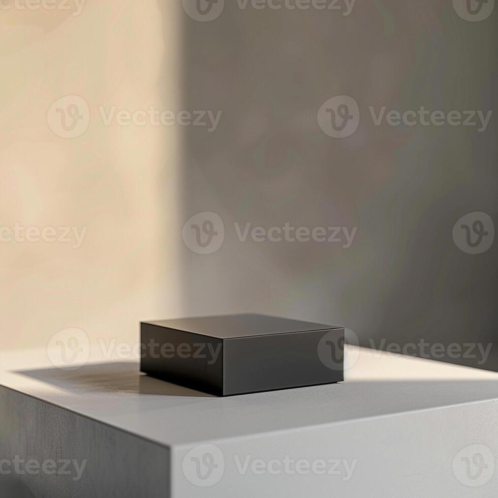 A black square on top of a white table photo