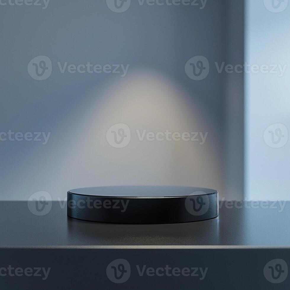 A black round object on a table in front of a window photo