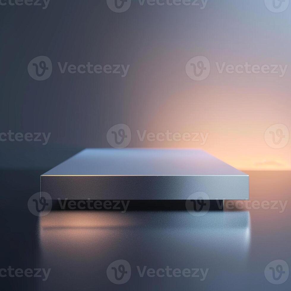 A silver box sitting on a table with a light behind it photo