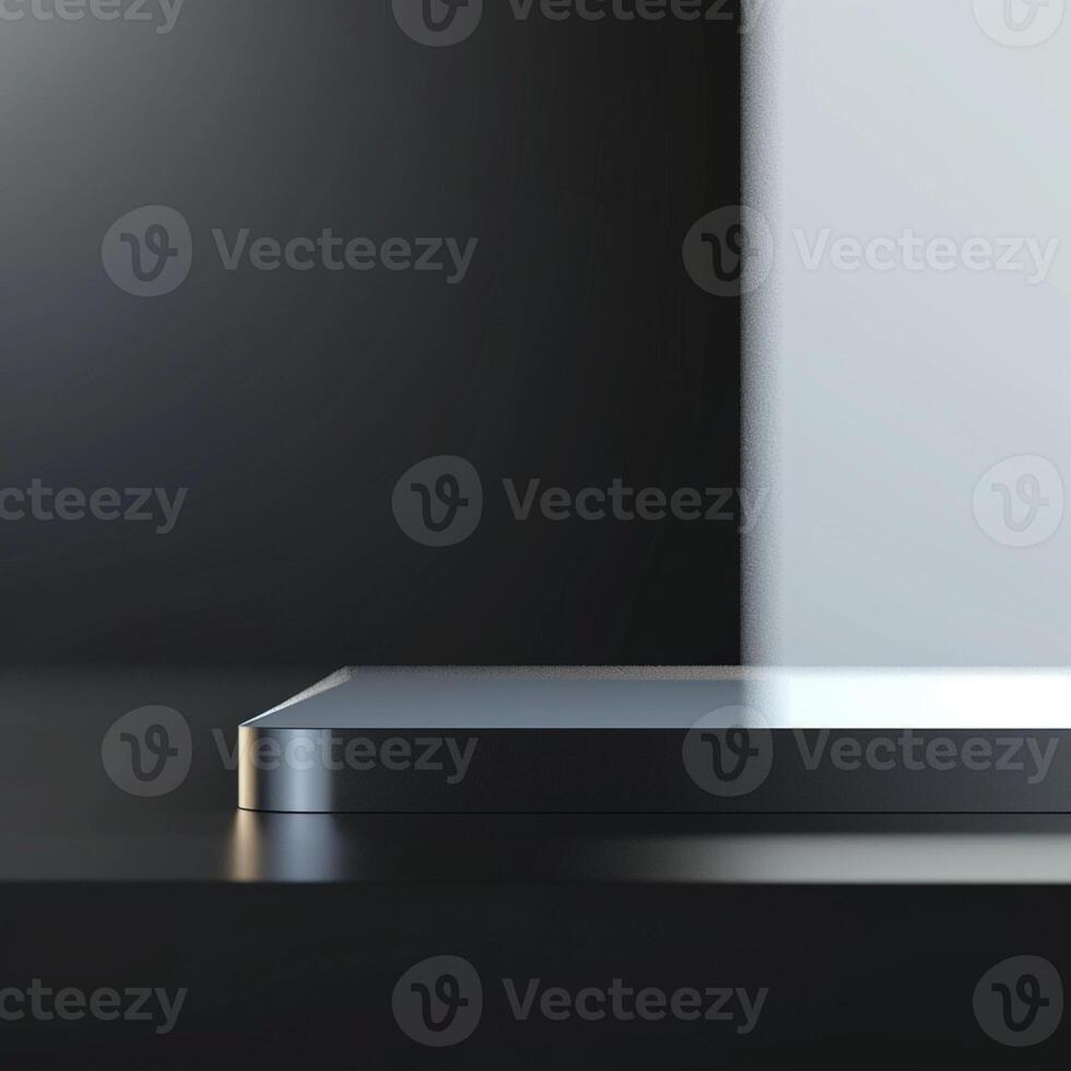 A black and white smartphone sitting on a table photo