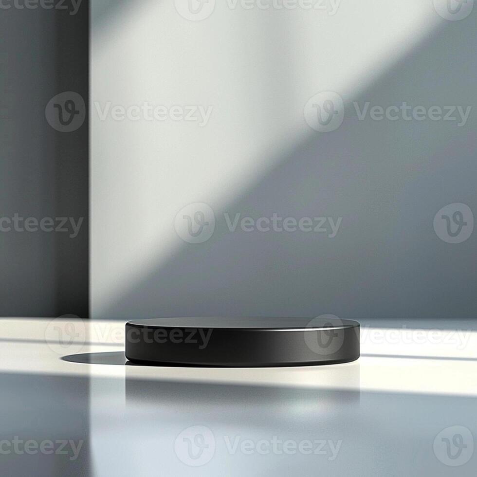A black object sitting on a table in front of a window photo