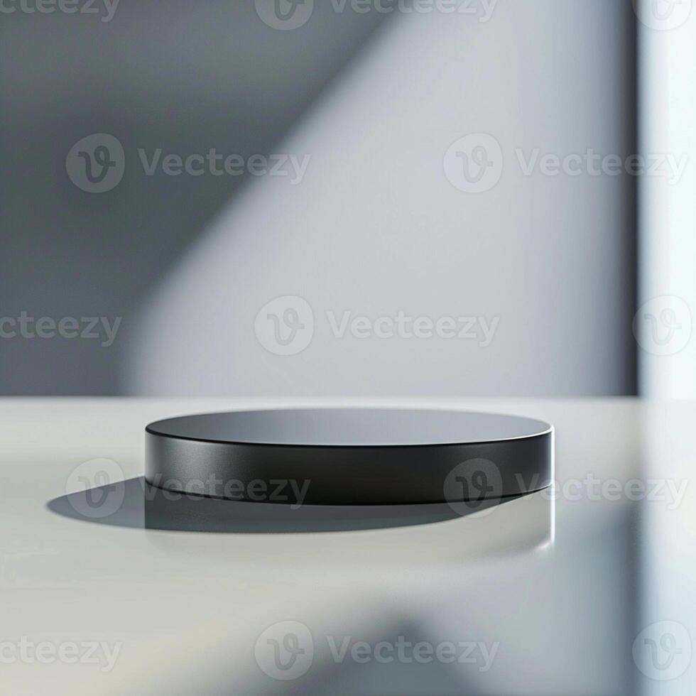 A black object sitting on a table in front of a window photo