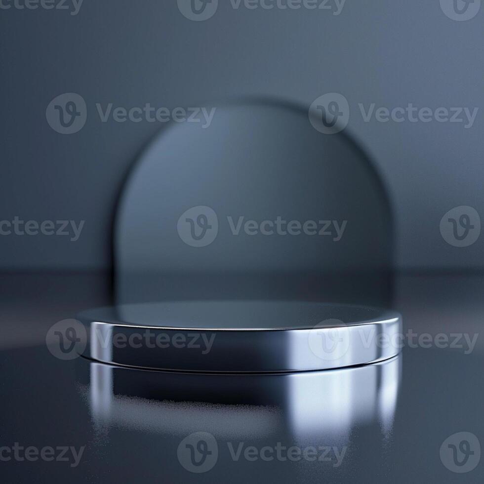 A round silver object on a black surface photo