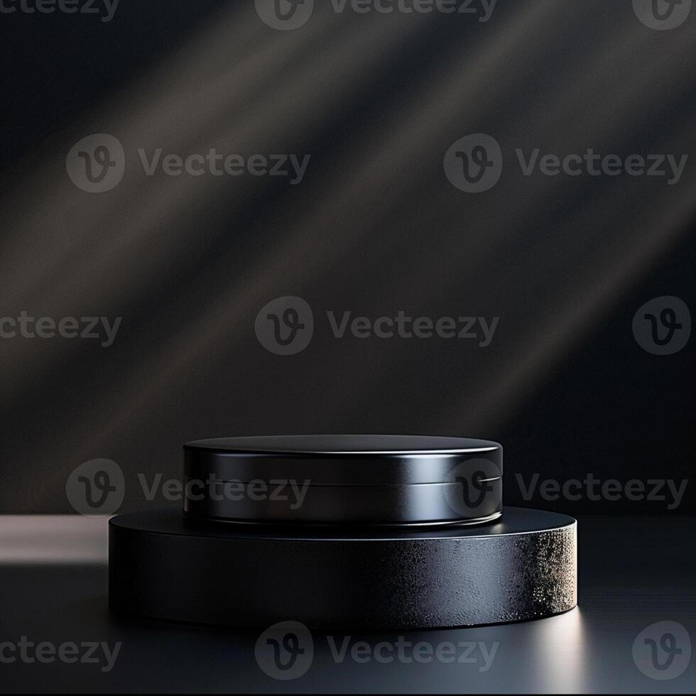 A black round container sitting on top of a table photo