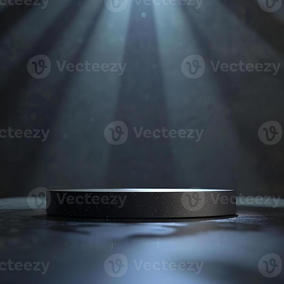 An empty black table in front of a spotlight photo