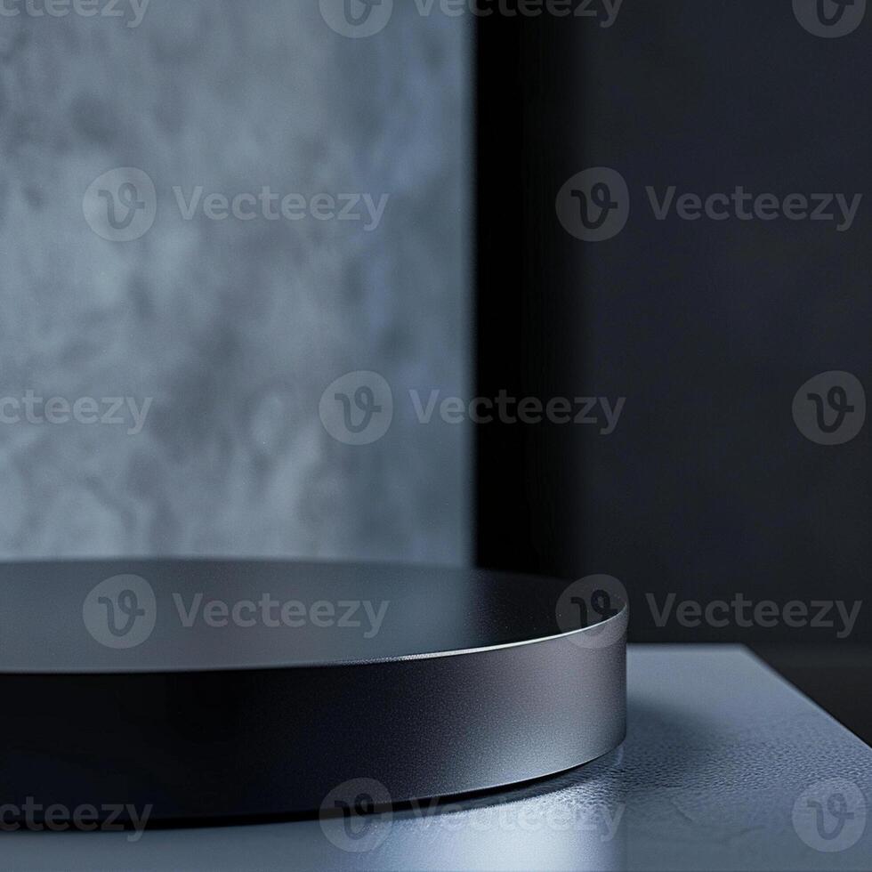 A black circular object on top of a table photo