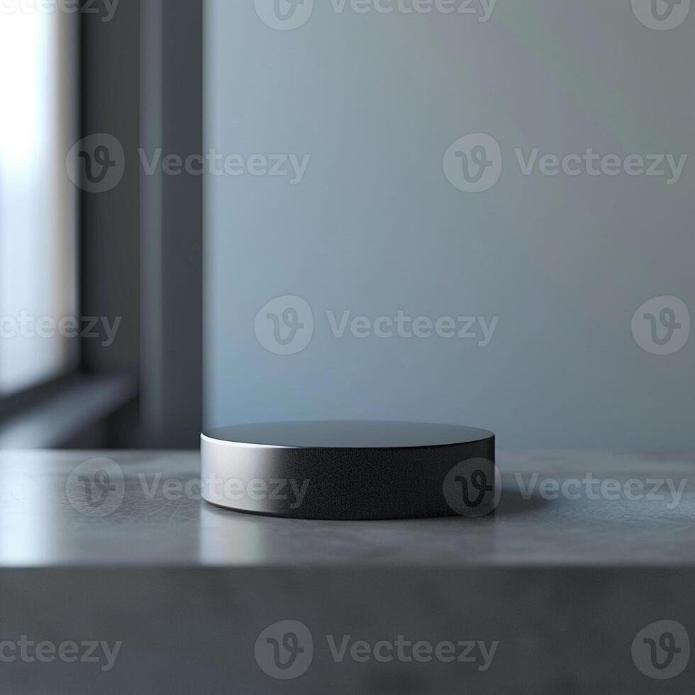 A black object sitting on top of a table photo
