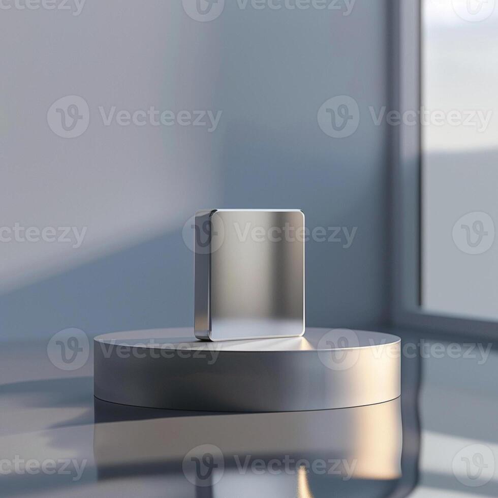 A square metal object sitting on a table photo