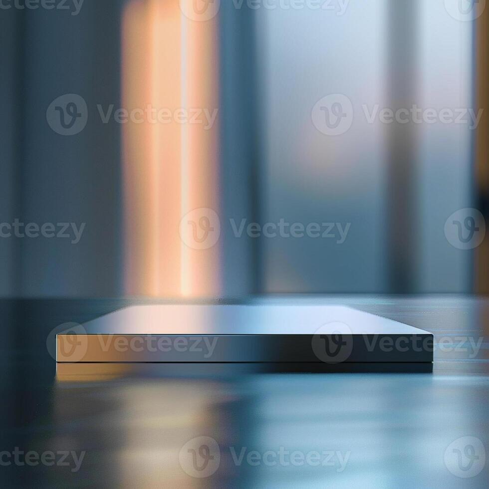 A white box sitting on a table in front of a window photo