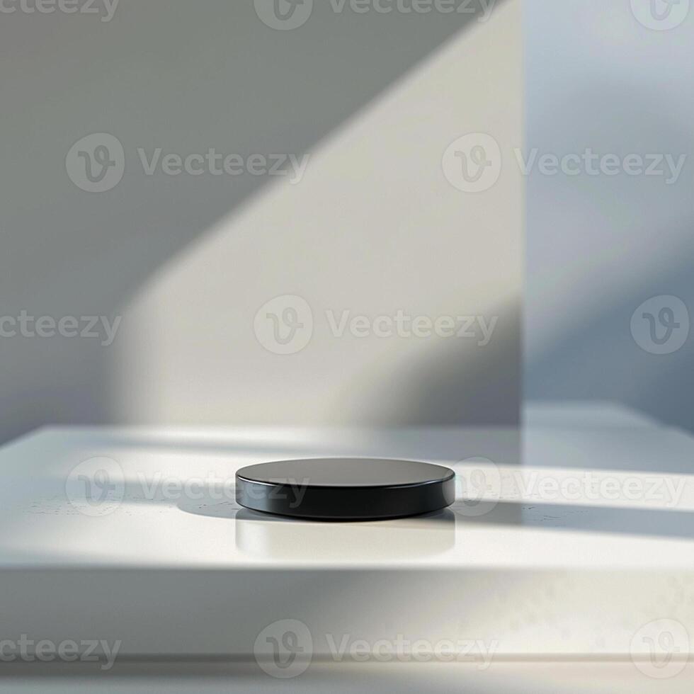 A black object sitting on top of a white surface photo
