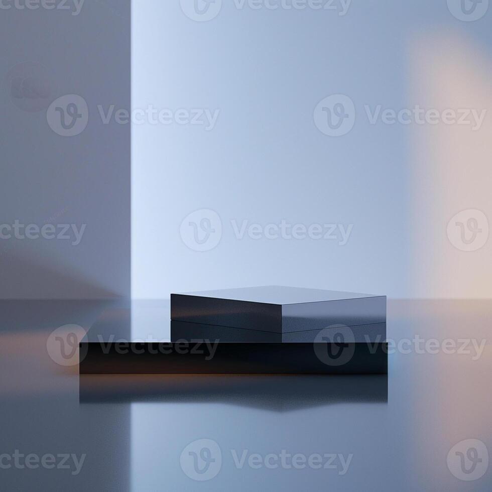 A black box sitting on a table in front of a wall photo