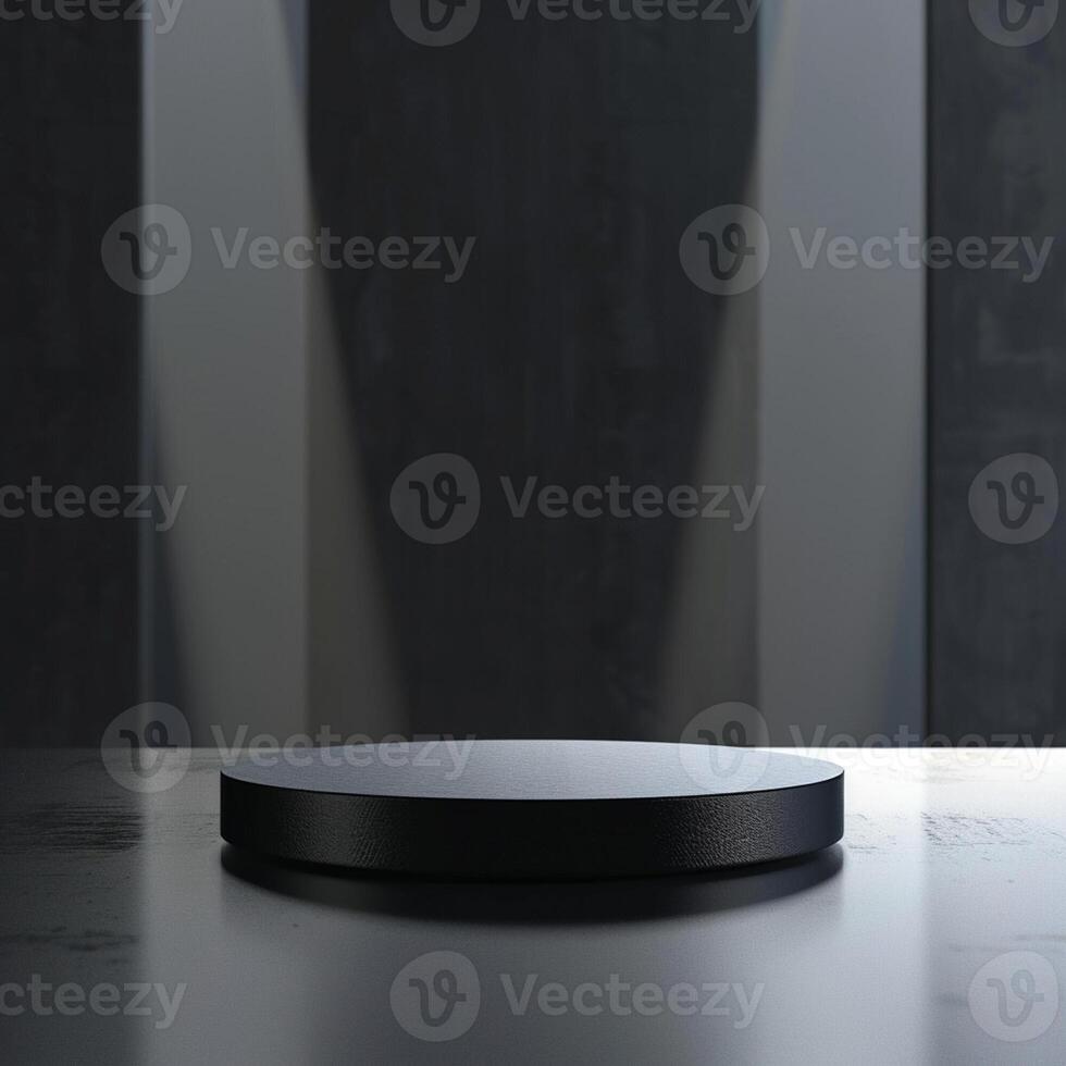 An empty black round table on a table in front of a wall photo