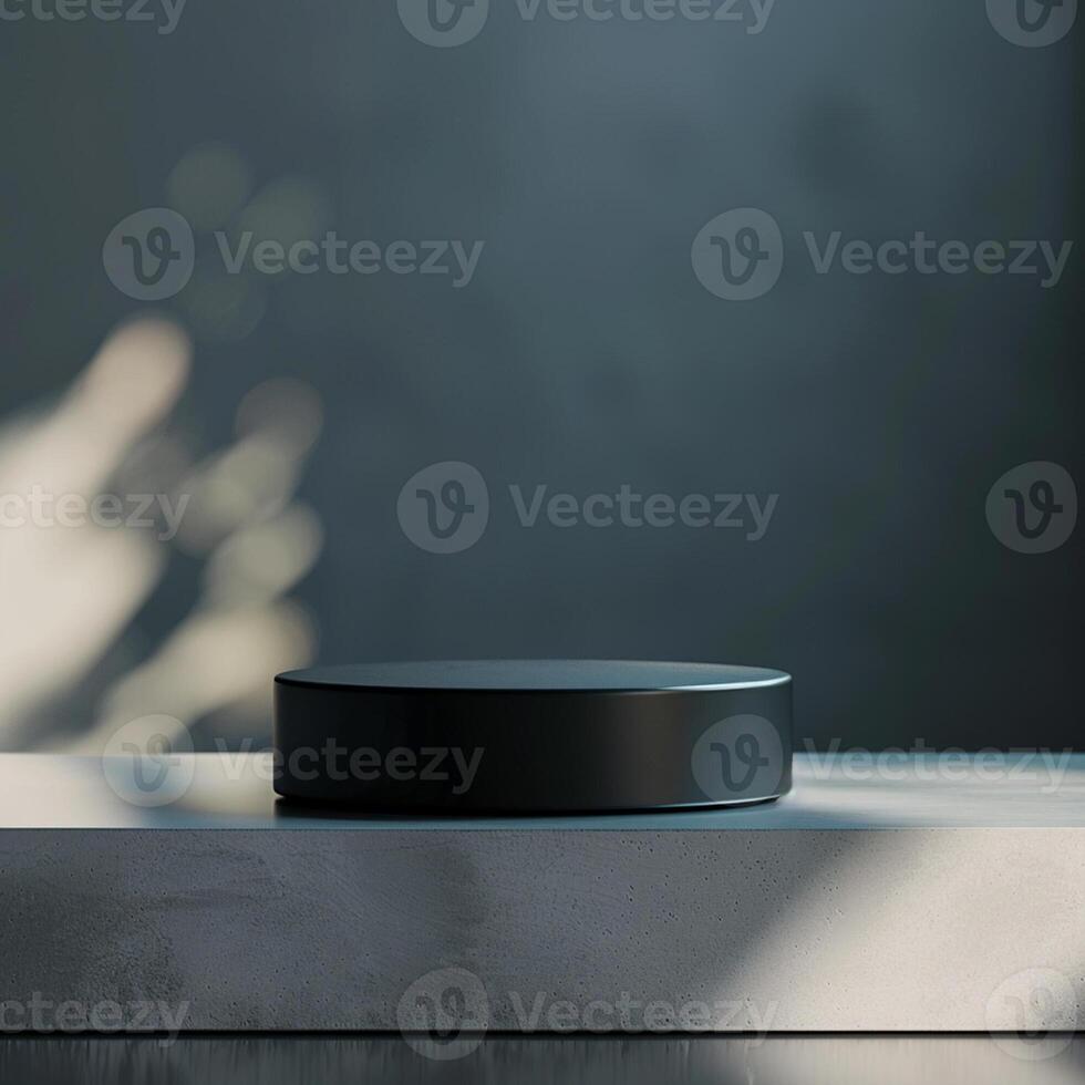 A black box sitting on top of a concrete surface photo