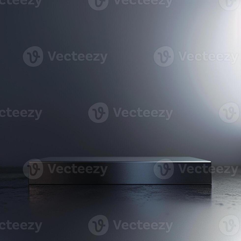 An empty black box sitting on a table in front of a wall photo