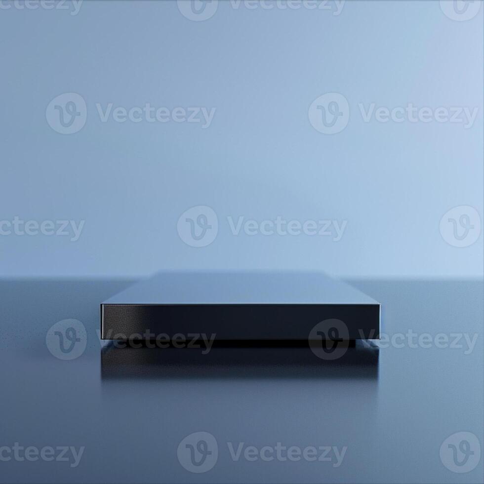 A black box sitting on a table with a blue background photo
