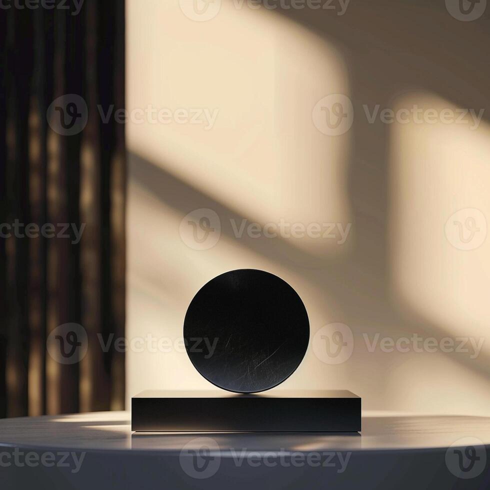 A black object on a table in front of a window photo