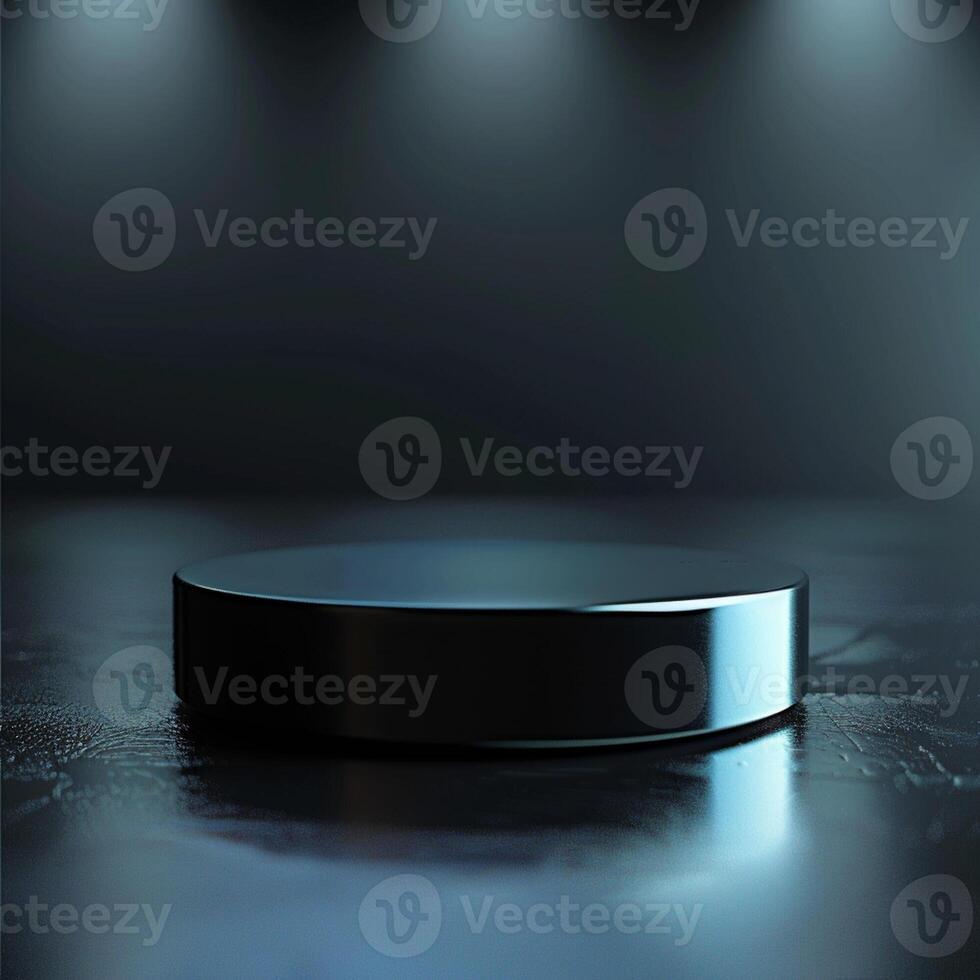 An empty black round table on a dark floor photo