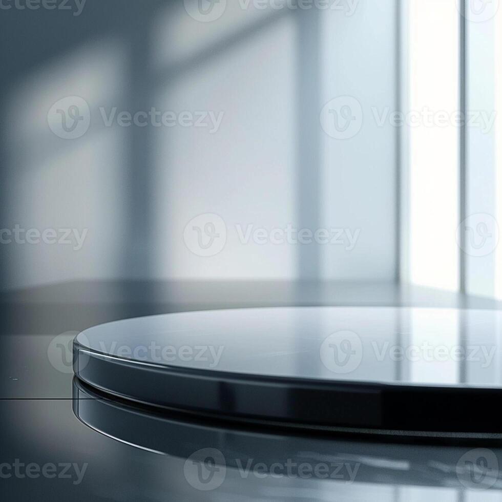 A glass table with a circular surface in front of a window photo