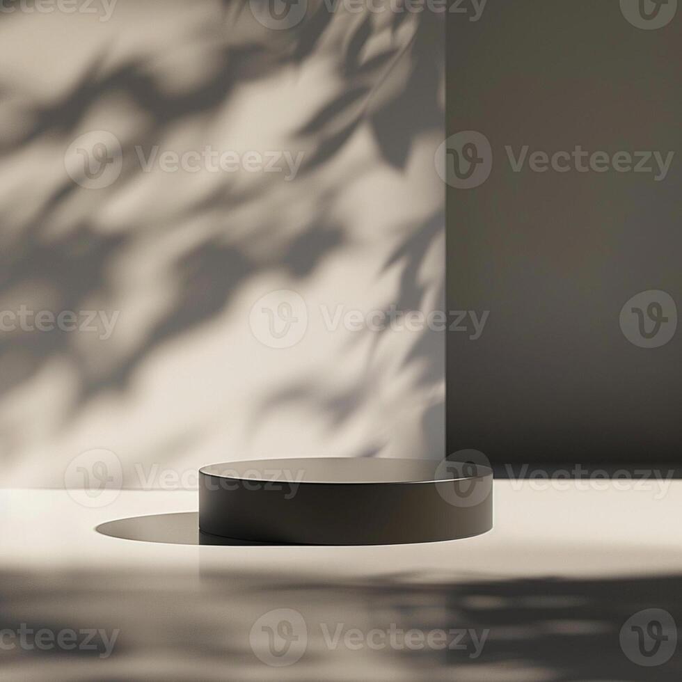 A black round table sitting in front of a wall photo