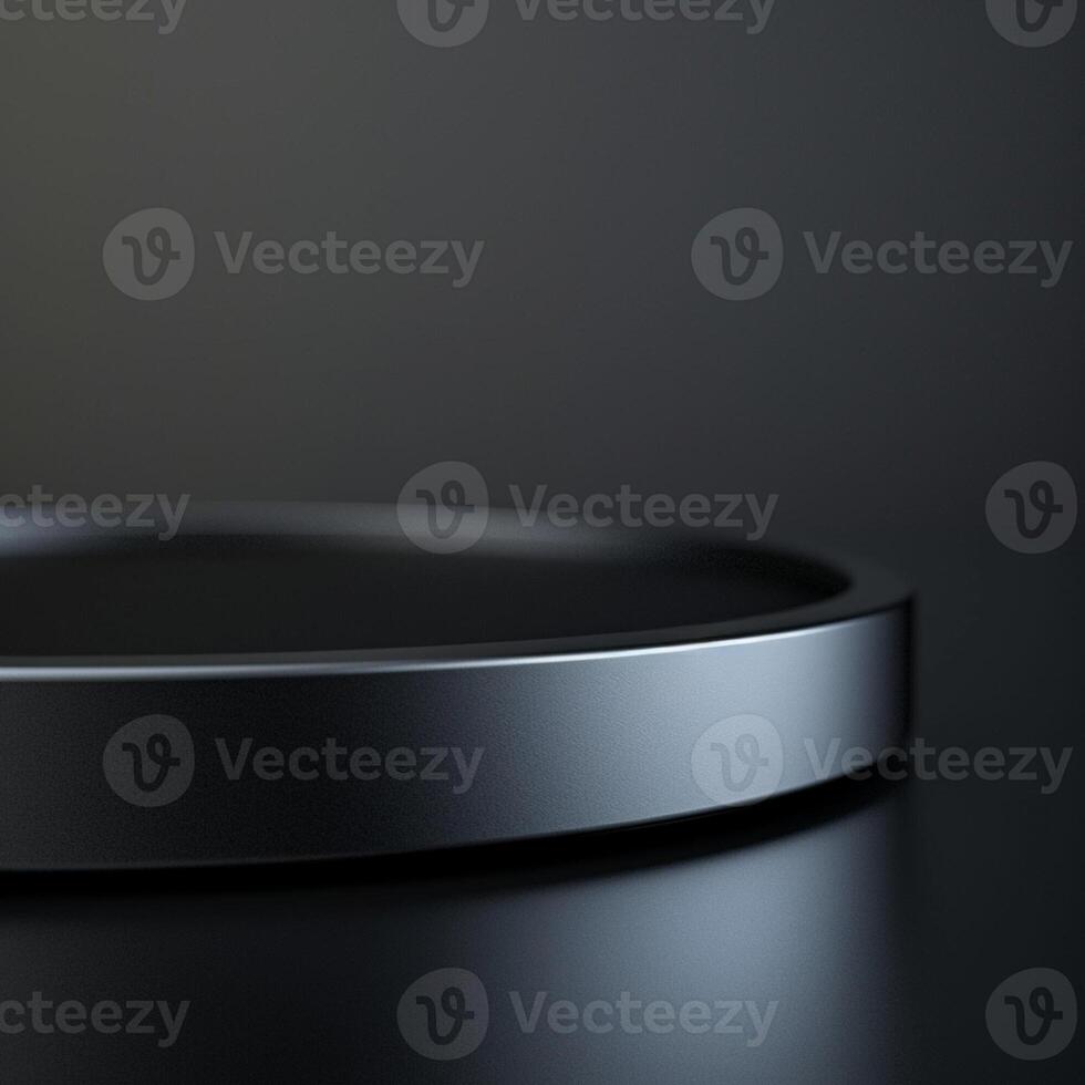 A black circular plate on a table with a black background photo