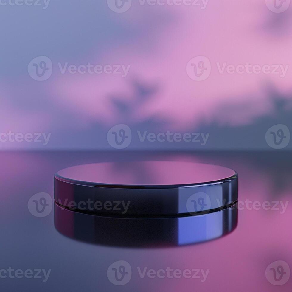 A black circular object on a table with a pink and purple background photo