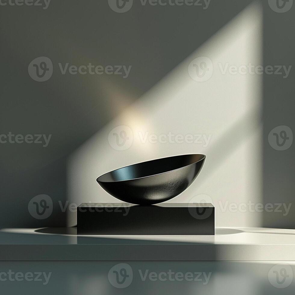 A black bowl sitting on a table in front of a window photo