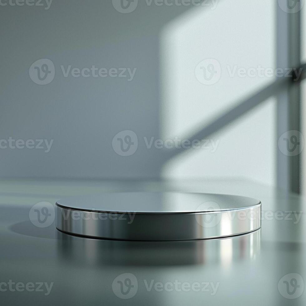 A silver round object sitting on a table photo
