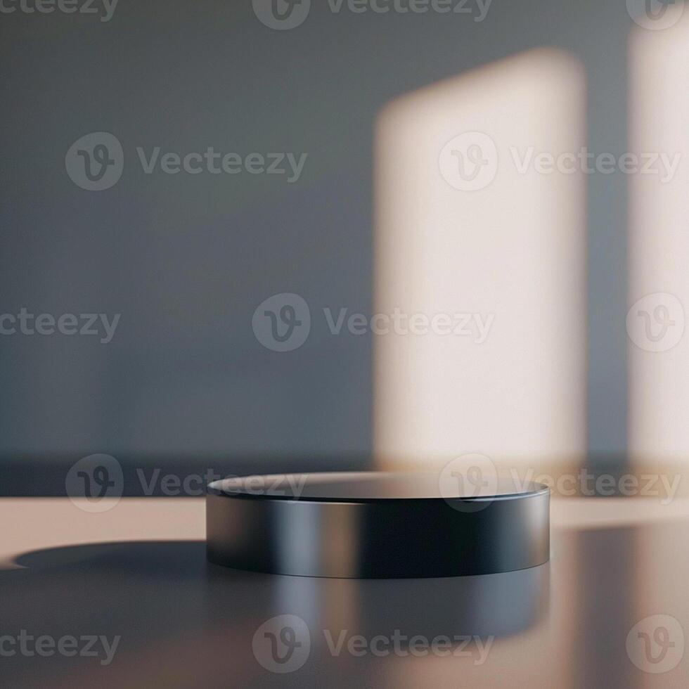 A black object sitting on a table in front of a window photo