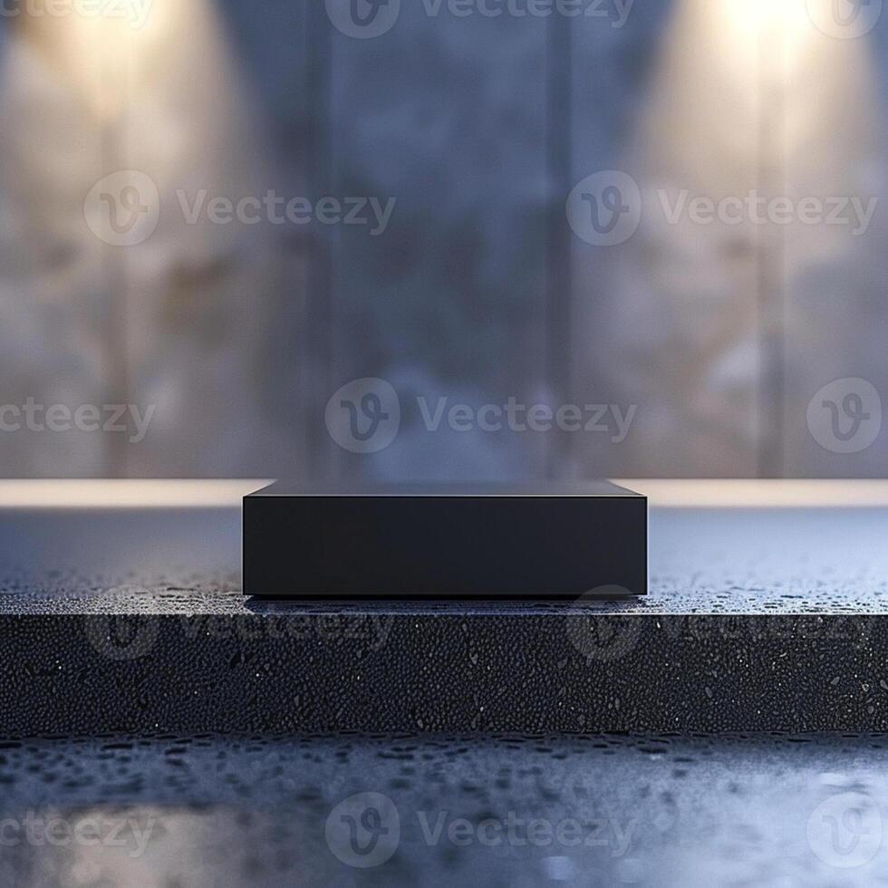 A black box sitting on a concrete floor photo