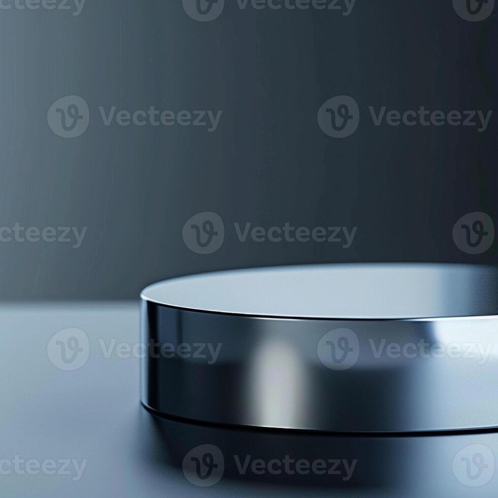 A silver circular object sitting on a table photo