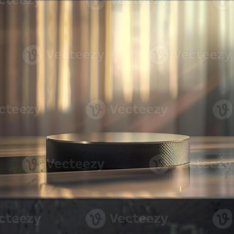 A small speaker sitting on top of a table photo