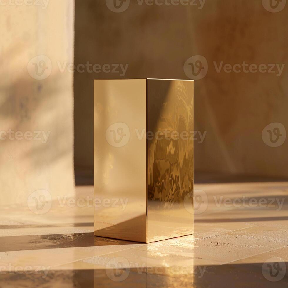 A golden cube sitting on a table in front of a wall photo