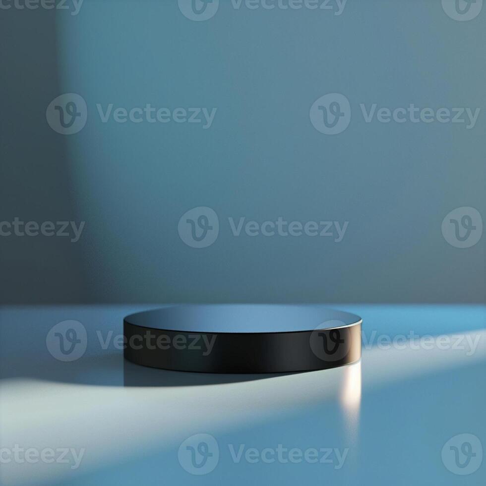A black round object on a table with a blue background photo