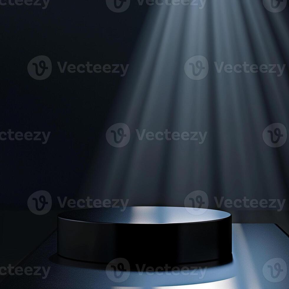 An empty black pedestal with light shining from the top photo