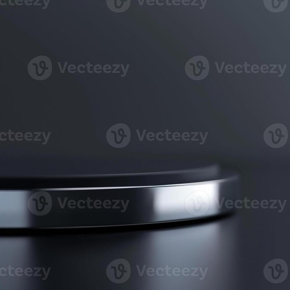 A black and silver circular object on a table photo
