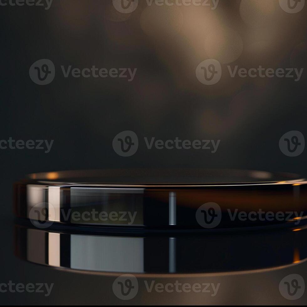 A black and gold ring on a table photo