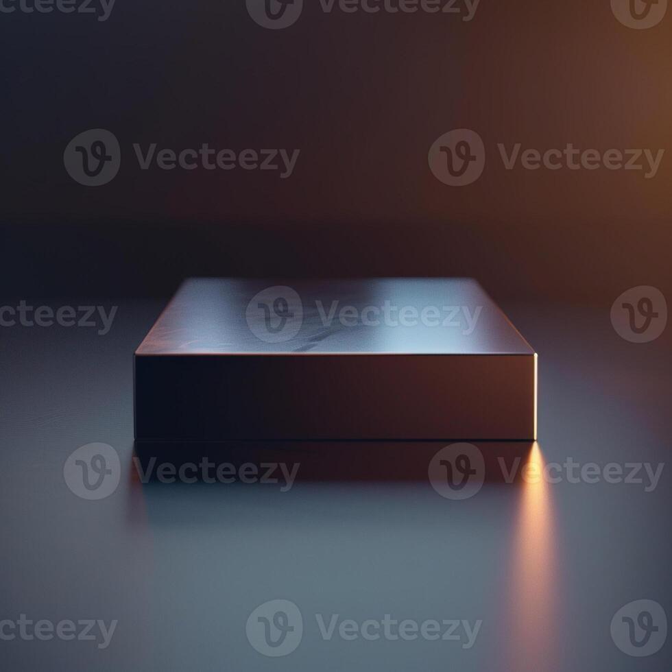 A black box sitting on a table with a light shining on it photo