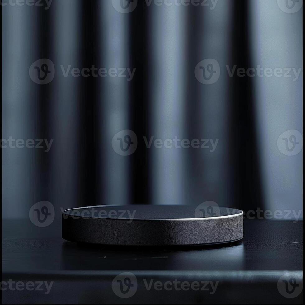 A black circular object on a table photo