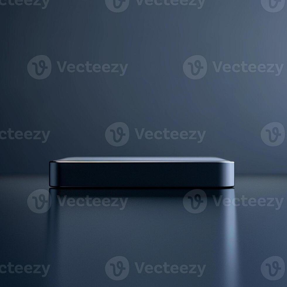 A black box sitting on a table with a dark background photo