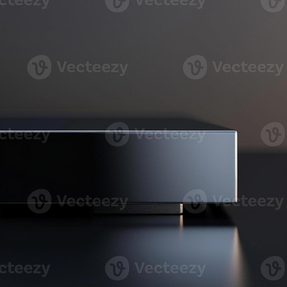 A black box with a silver surface photo