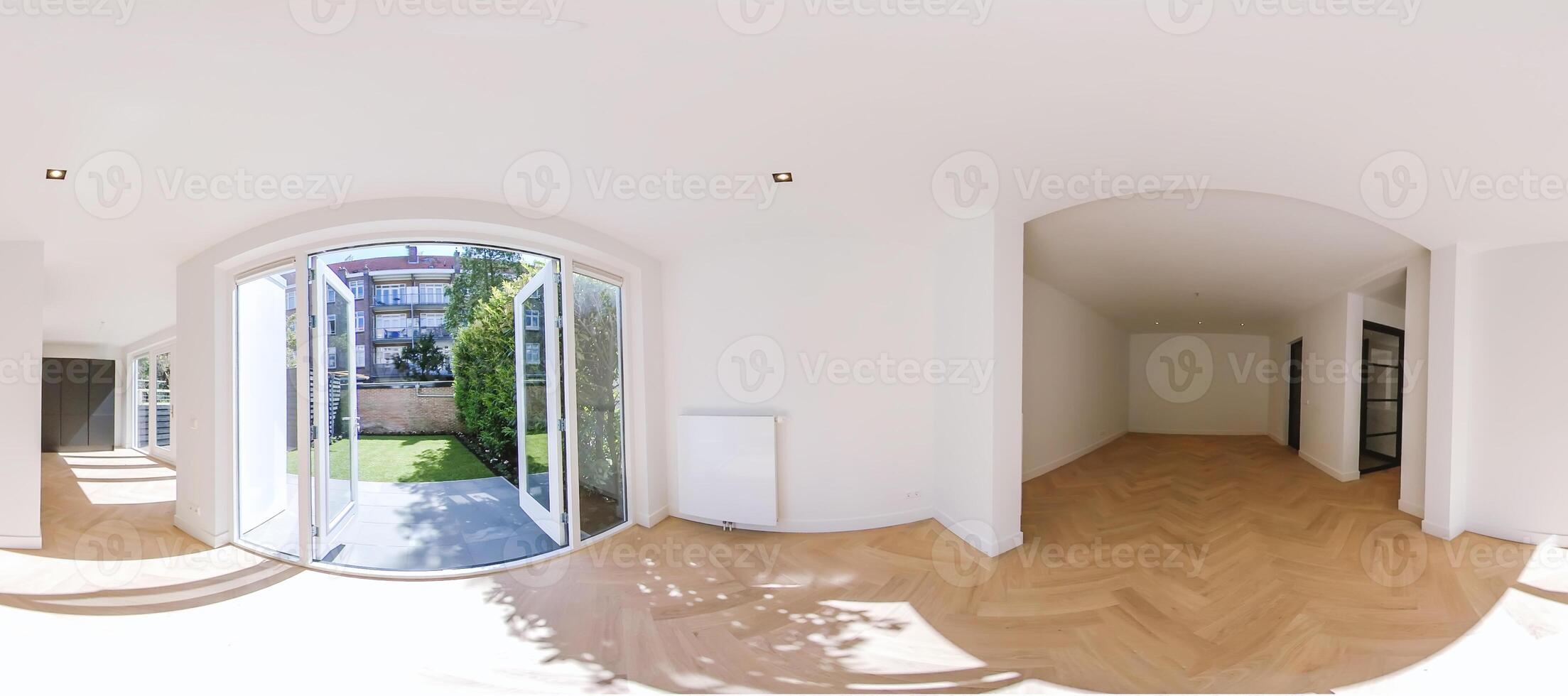 360 degree panorama of a room with a large window photo