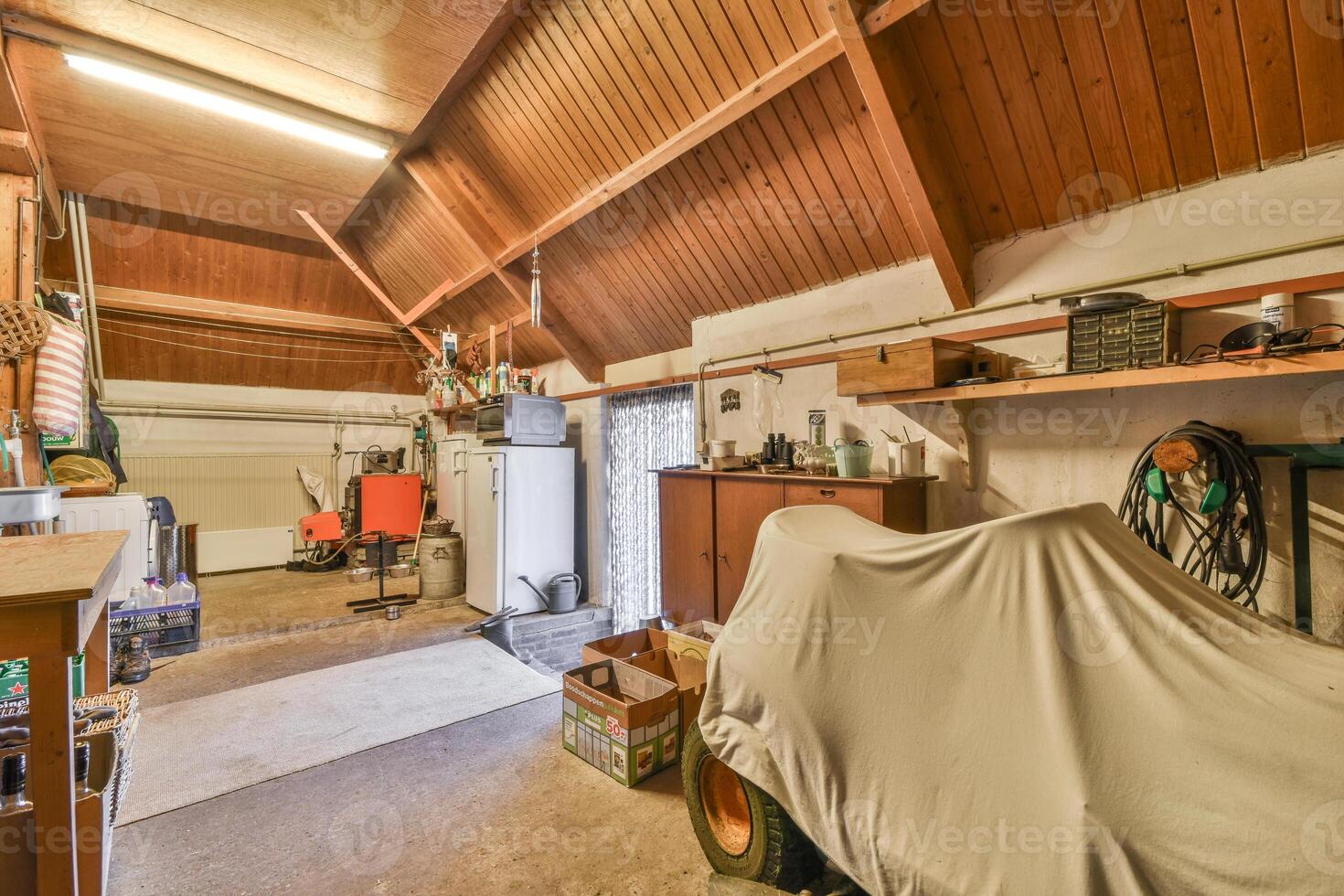 A garage with a motorcycle and a motorcycle helmet photo