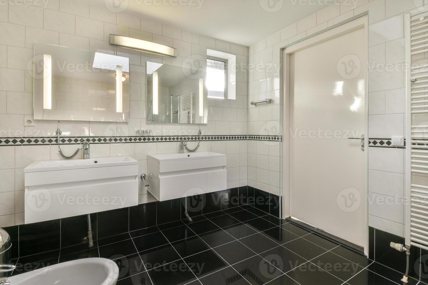 A bathroom with a sink and a mirror photo