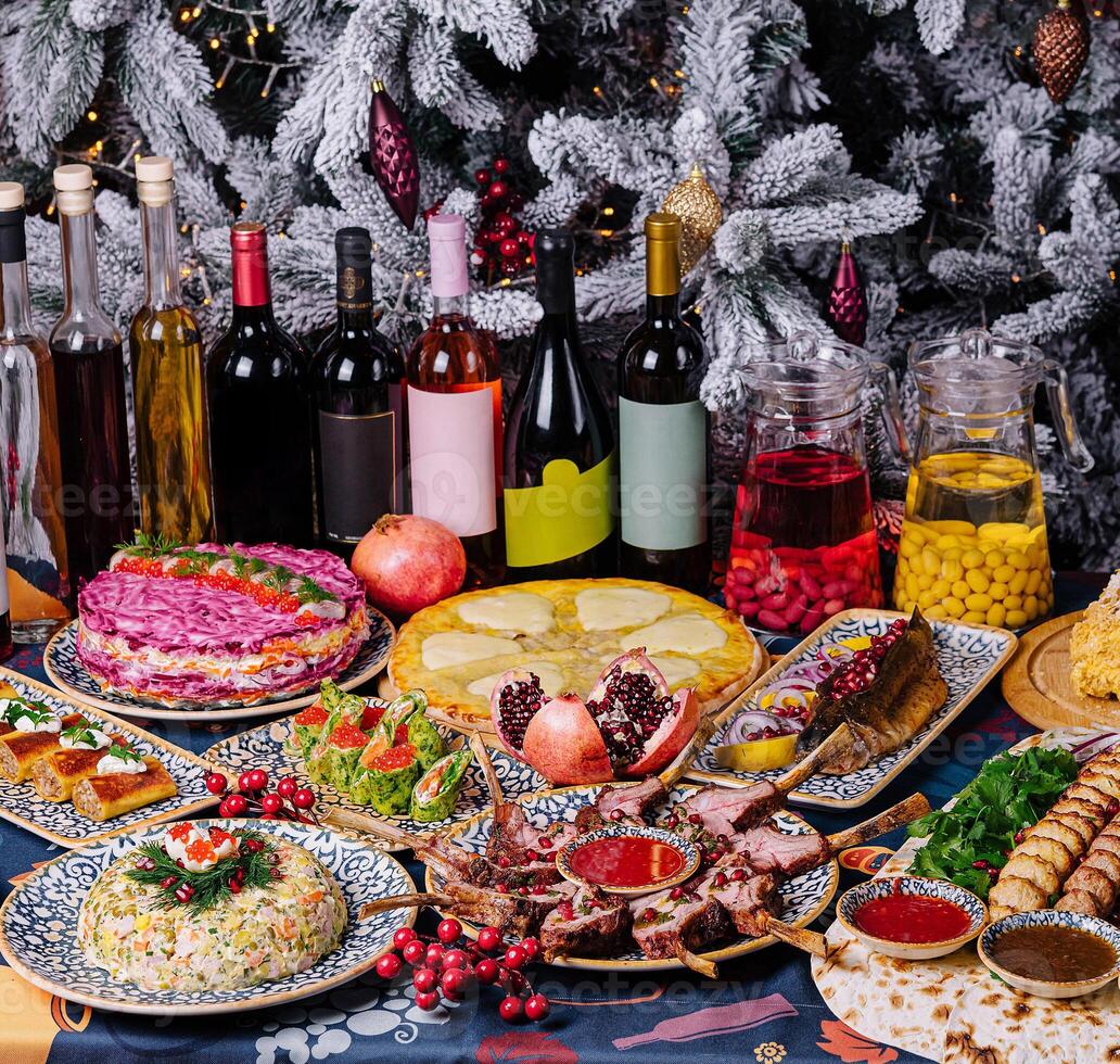 Festive holiday feast with a variety of dishes and wines photo