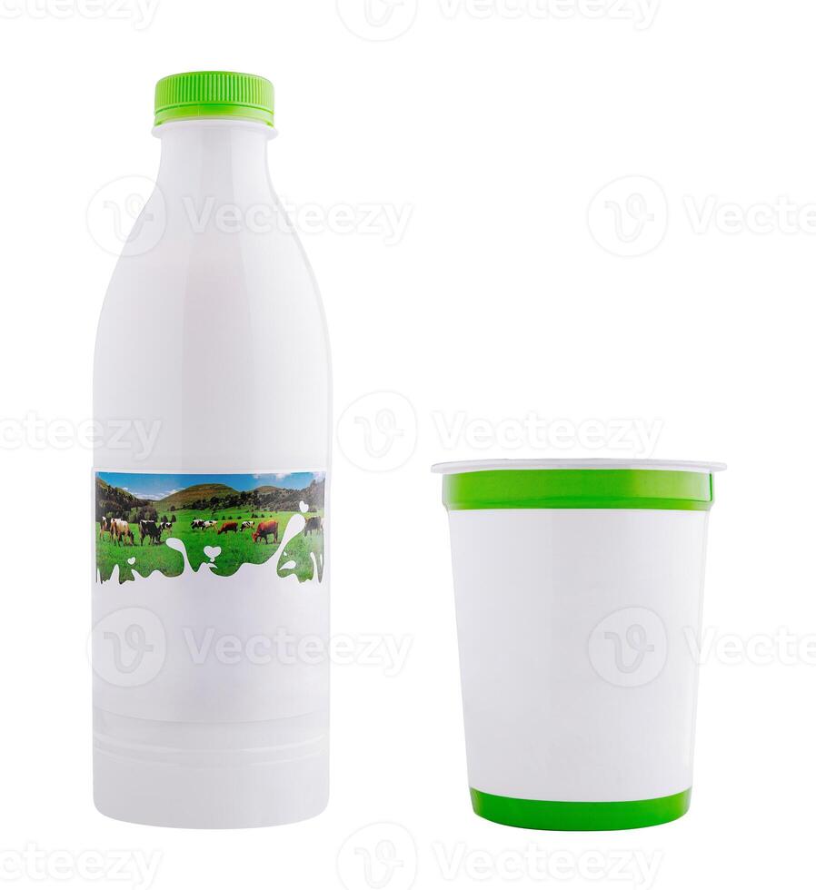 White plastic bottle and cup with green blank label for dairy products isolated on white background photo
