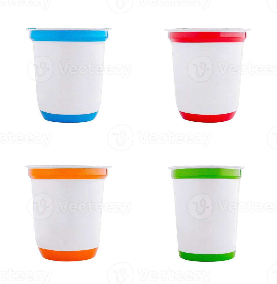 Set of blank yogurt cups with colorful lids isolated on white background photo