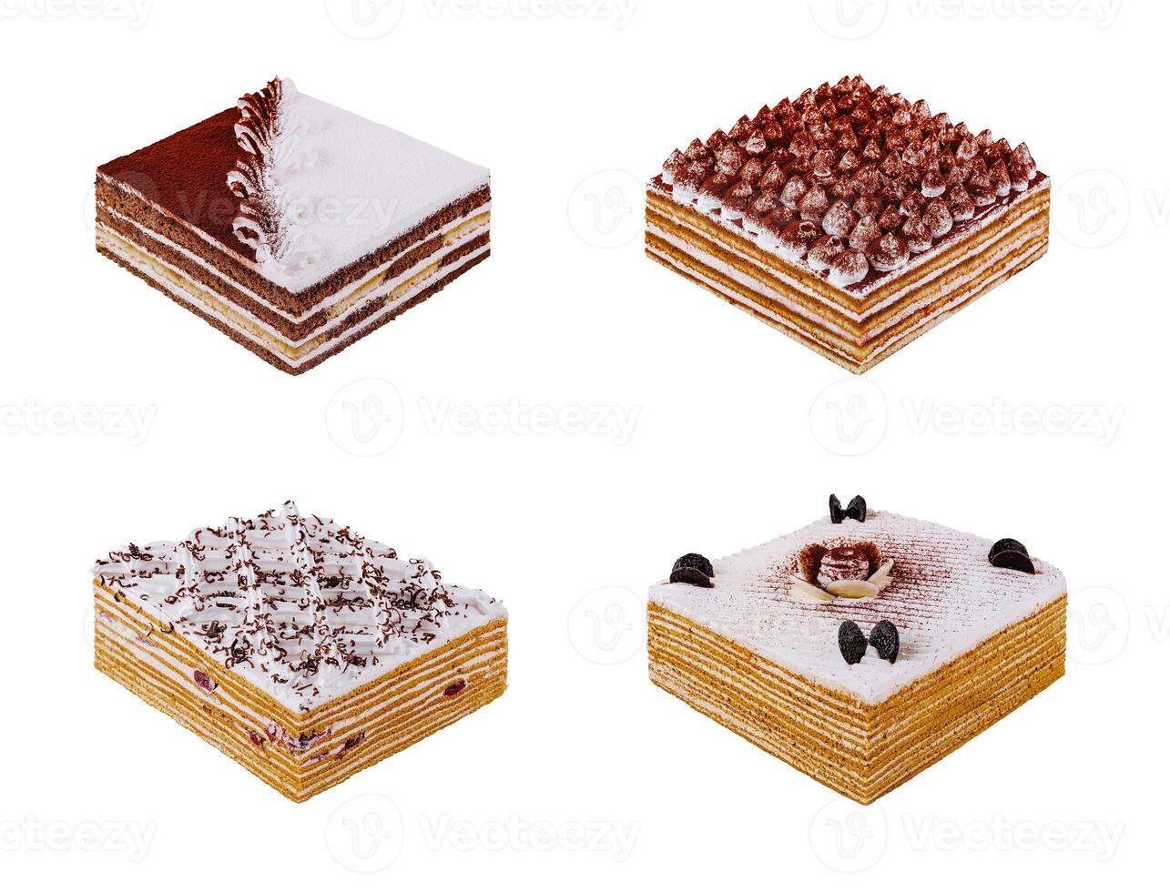 Four delicious square cakes with various toppings are waiting to be eaten photo