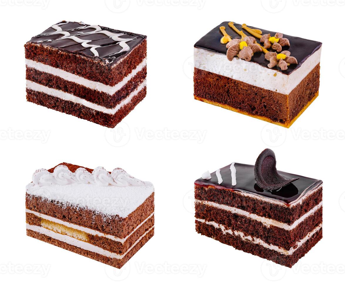 Four slices of various cake isolated on white background photo